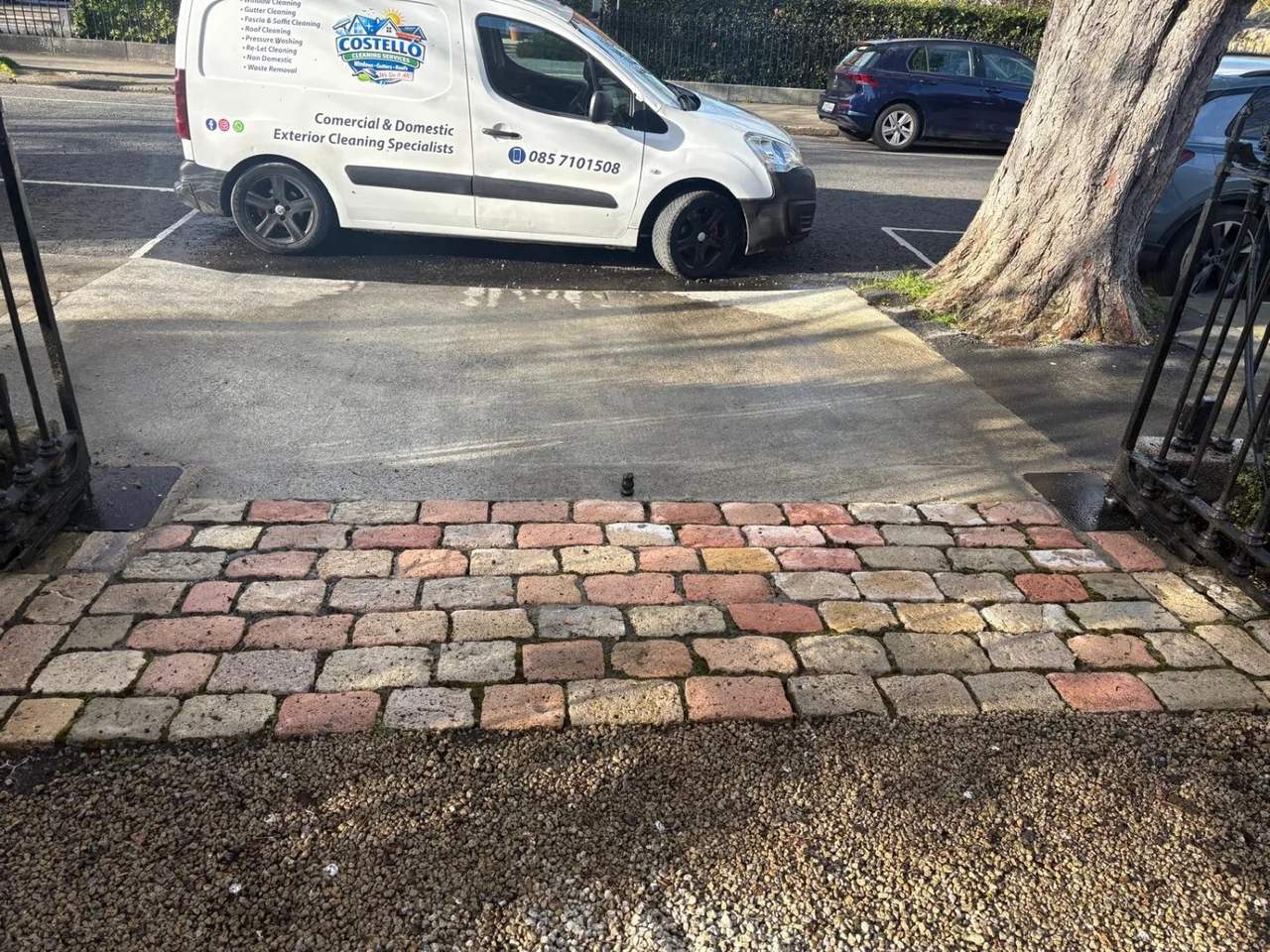 Costello Cleaning van outside a freshly cleaned cobble entrance